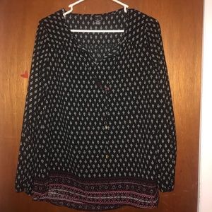 Black shirt with white and burgundy design